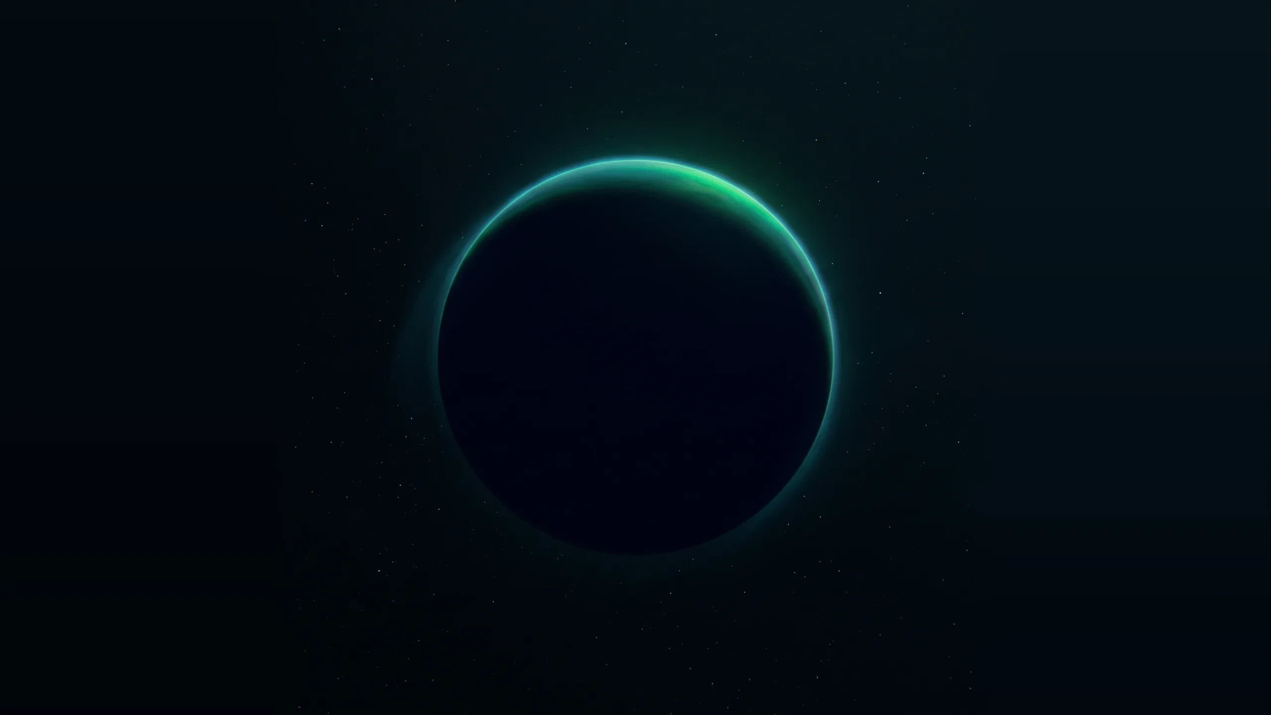 A dark sphere in space, only a thin green rim of light tracing its edge.